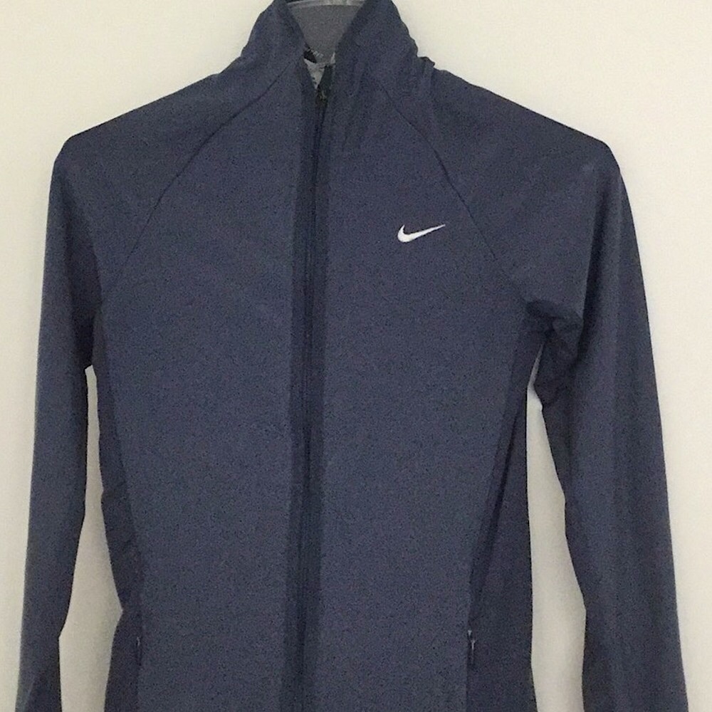 Nike warm up jacket.